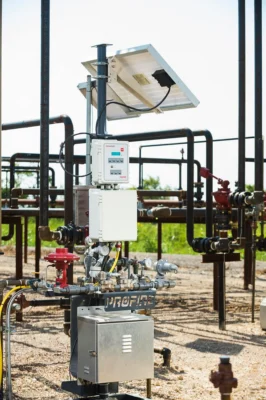Profire technician inspecting industrial burner system in the field