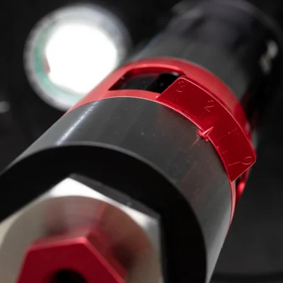 Close-up of Profire M7 pilot setting indication marks with numbered red adjustment ring