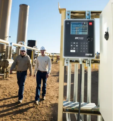 Image of employees by a burner management system