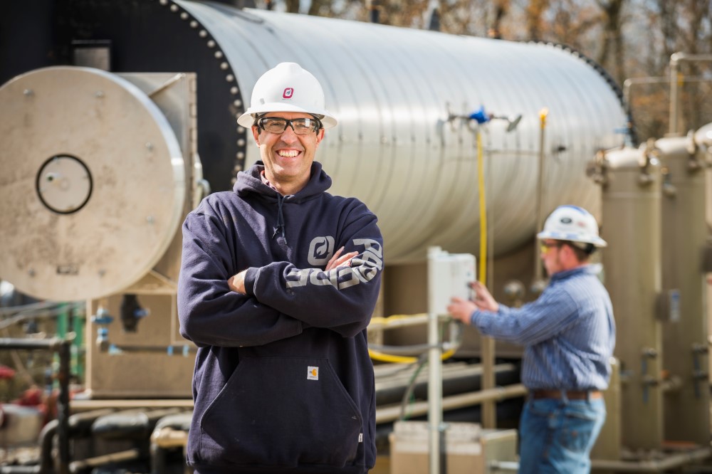 Profire Expert Smiling Proudly Towards Camera While On site