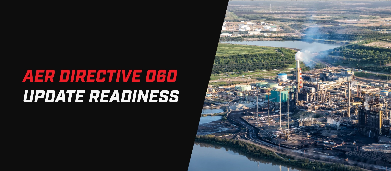 Banner graphic titled “AER Directive 060 Update Readiness.” The left side features a black background with the title in large italicized text, with “AER Directive 060” in red and “Update Readiness” in white. The right side shows an aerial view of a large industrial oil and gas processing facility with storage tanks, smokestacks emitting steam or smoke, waterways, and surrounding forested landscape. A diagonal black divider separates the text and facility image.