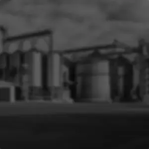 blurred black and white photo of multiple industrial drying equipment sets