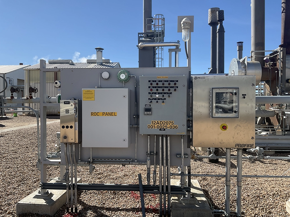 Profire PF3100 burner management panel installed beside the incinerator control and ROC panels.