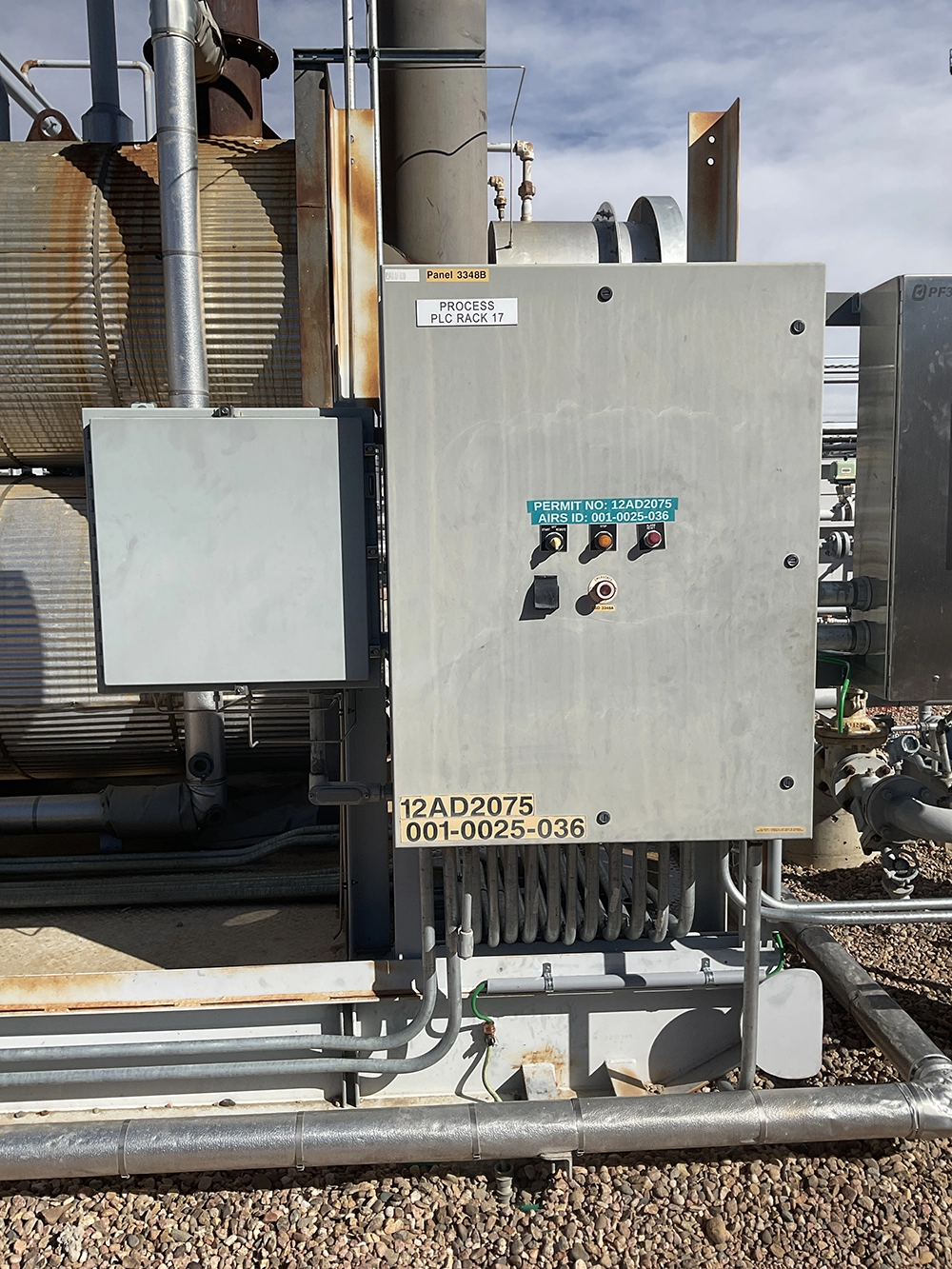 Process PLC control panel installed beside the insulated glycol reboiler.