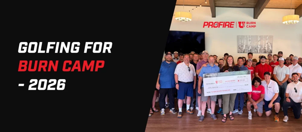 Group photo of PROFIRE employees and event participants holding a Burn Camp donation cheque at the PROFIRE 2026 golf tournament.