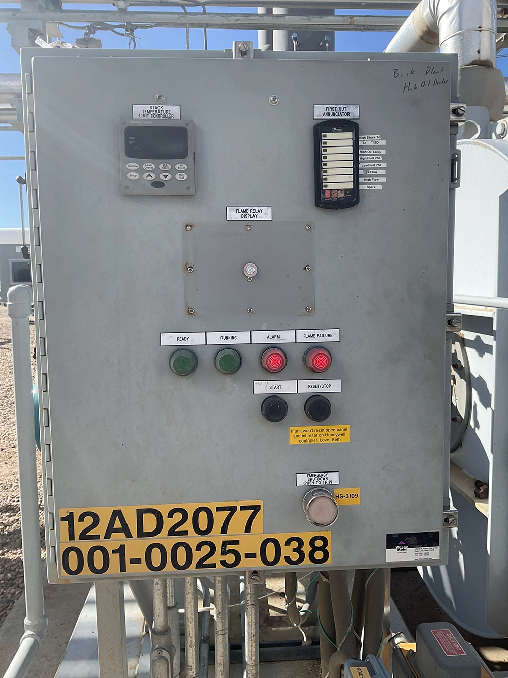 Legacy heater control panel with temperature controls, first-out annunciator, indicator lights, and shutdown button.